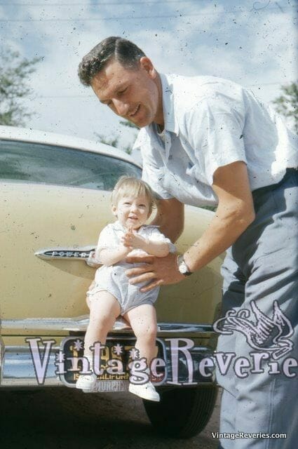 1950s Father and Daughter with Vintage Car
