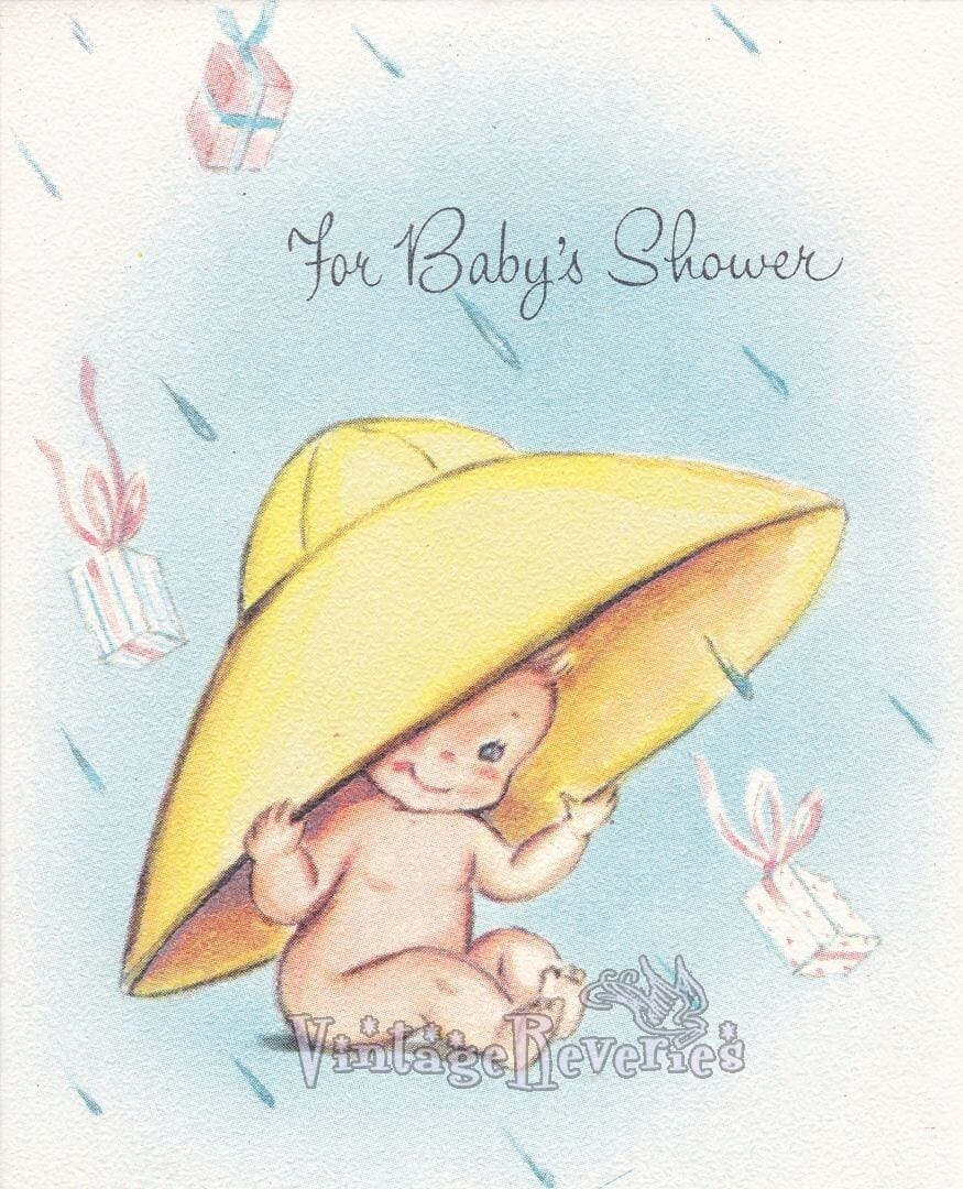 baby under a yellow umbrella in the rain