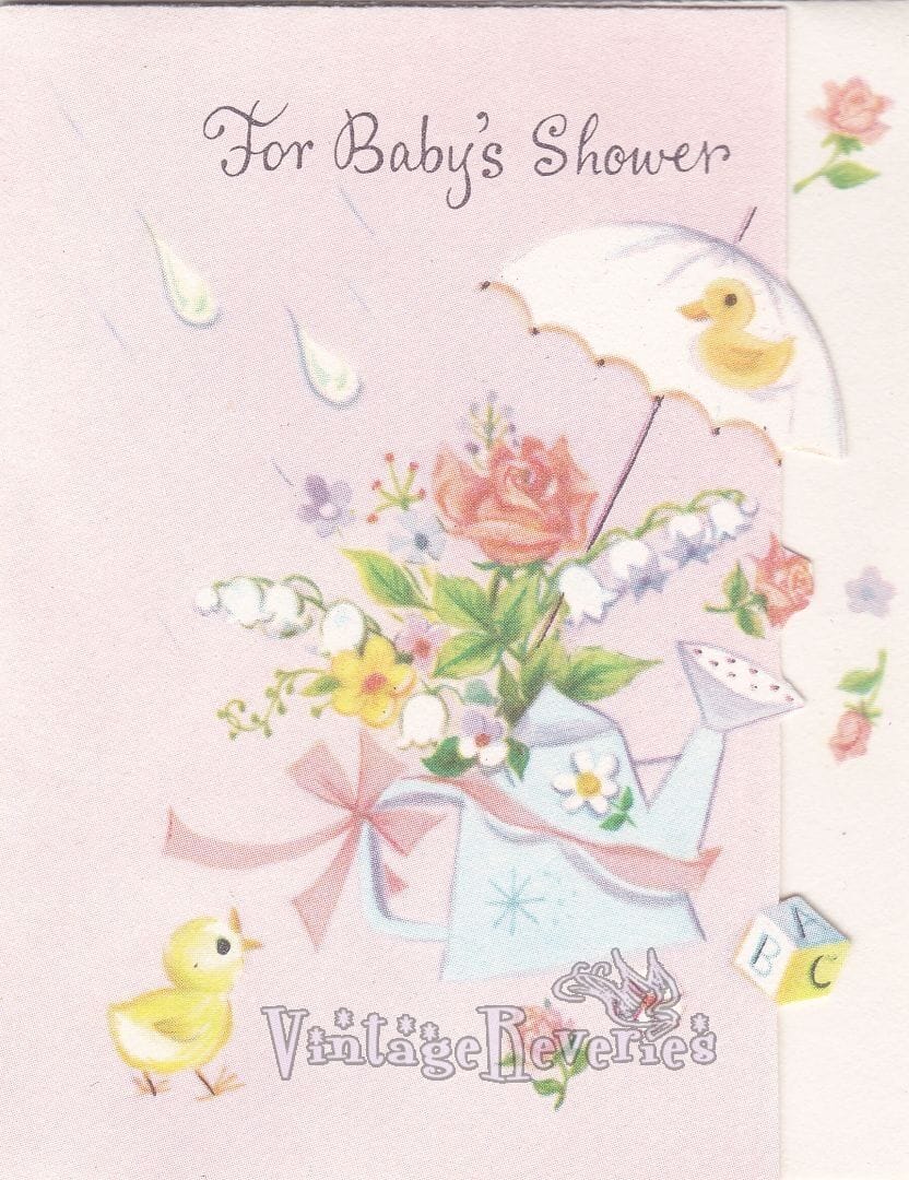 baby shower card with an umbrella and flowers