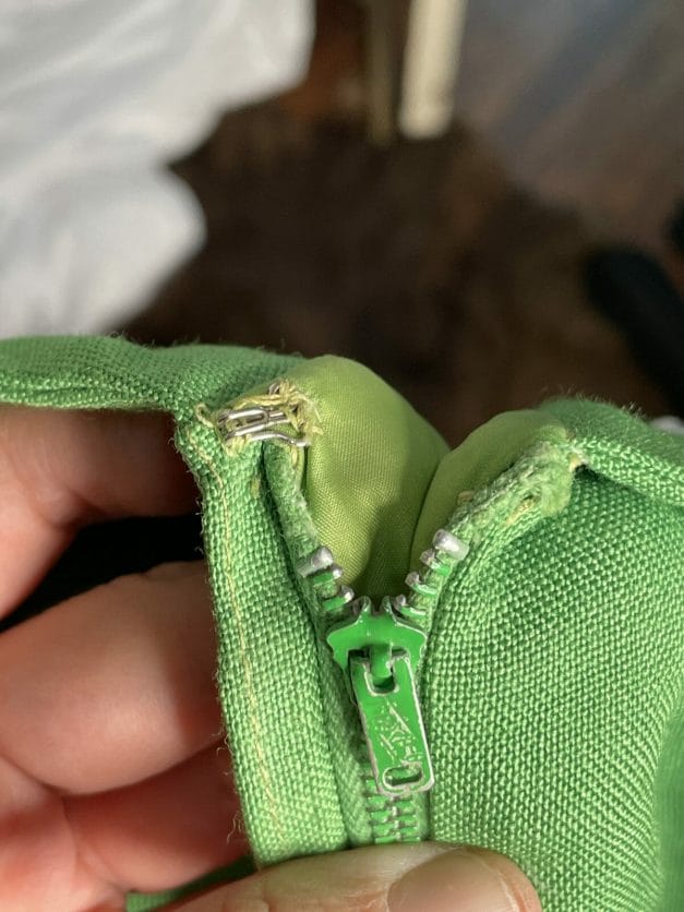 green metal zipper