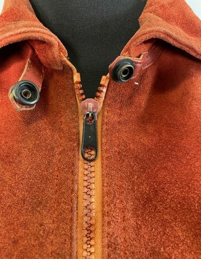 close up of red leather coat